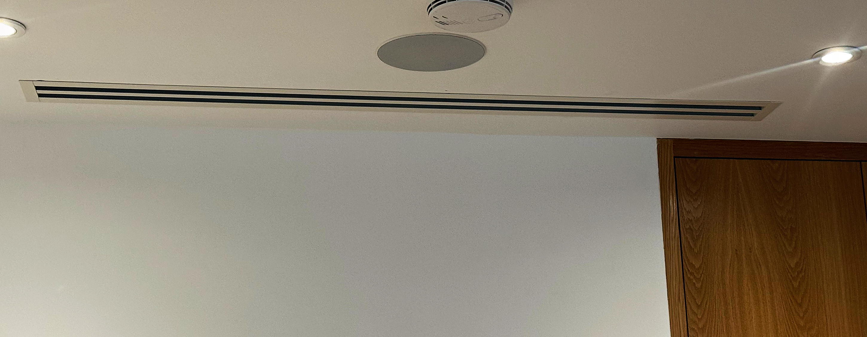 Slimline ducted grille set into a ceiling