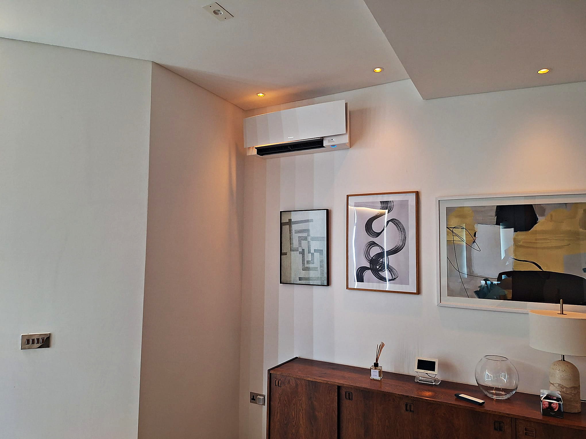 Wall mounted unit fitted high on the wall of a finished room