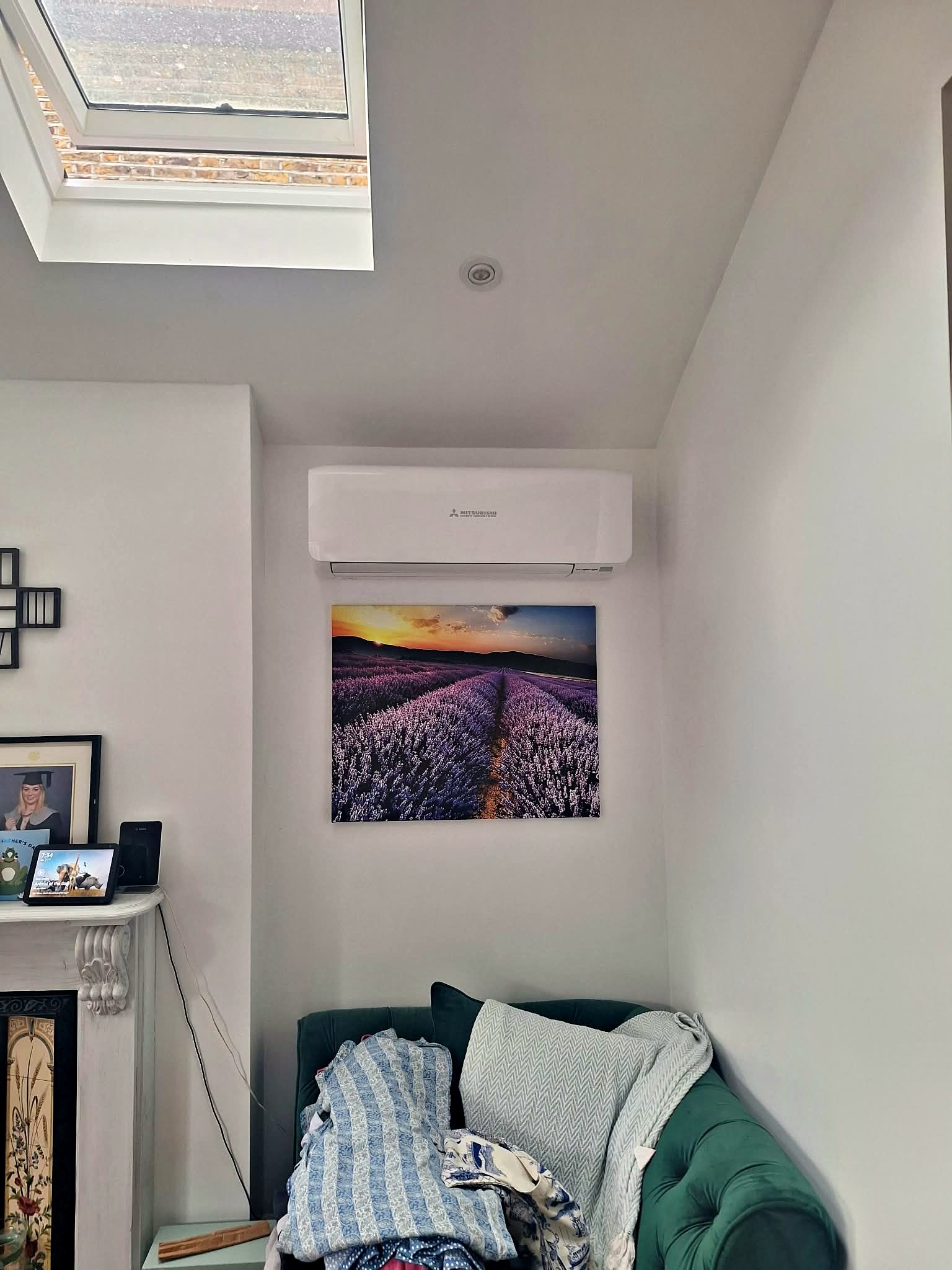 Wall mounted unit fitted high on the wall of a finished room