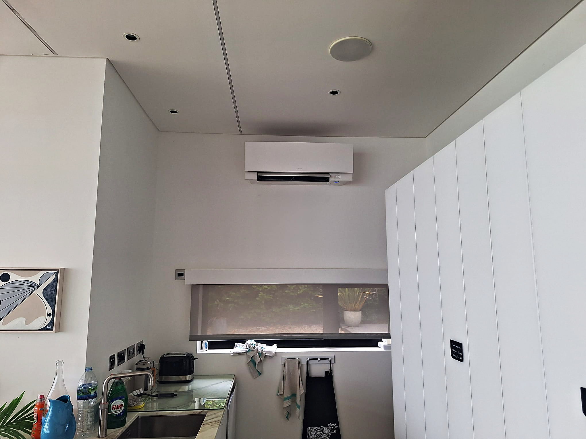 Wall mounted air conditioning unit in a finished room
